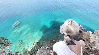 The cute girlfriend passionately sucks dick on the beach