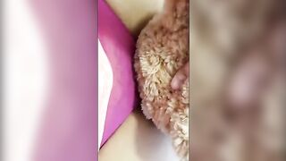 A girl is fucking with a teddy bear instead of a real guy