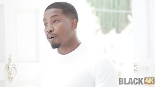 A black guy checks the equipment and gets intimate with a brunette