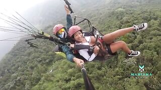 A sexy woman squirts while flying a parachute over the sea, just like Mariana Martix