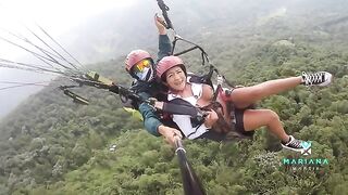 A sexy woman squirts while flying a parachute over the sea, just like Mariana Martix