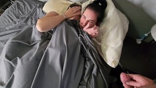 A man pissed on two girls in bed, and they became wet and made out