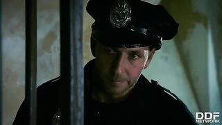 Hot blonde hooker Rosella Visconti gets fucked by two guys in a police station scene