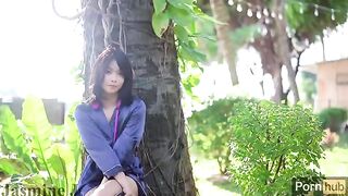 A cute Asian girl has sex in the garden