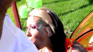 A cosplay model with tattoos, Lily Fatale, gets fucked outdoors in a steamy scene
