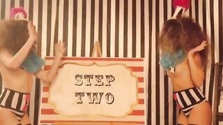 The clowns play with each other and make the audience happy together