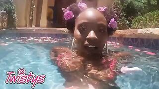Elsie enjoys sensual solo moments in the pool, showcasing her stunning curves