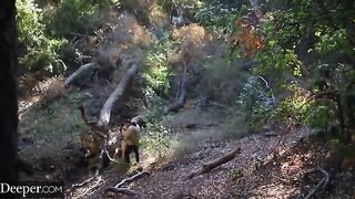 The guy is fucking two girls in an intense threesome scene