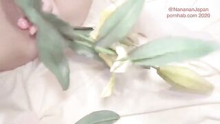 Bukkake with a girl putting flowers in her ass