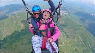 A girl squirts while paragliding in 2200 m above the sea, an extreme act