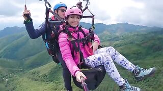 A girl squirts while paragliding in 2200 m above the sea, an extreme act