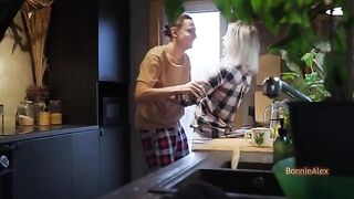 A couple has a quickie right in the middle of the kitchen