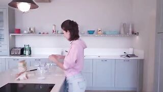 I cooked and stripped at a friend's house, showcasing my sensual side in a steamy kitchen scene