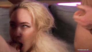 Two guys are fucking with a blonde with huge boobs