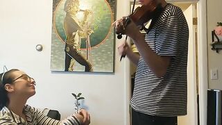 Trying to practice violin with my real couple passion
