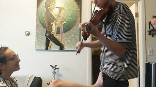 Trying to practice violin with my real couple passion
