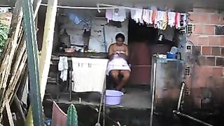 A hidden camera captured a black woman's intimate moments, unaware of being filmed