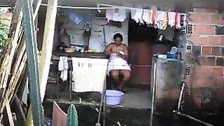 A hidden camera captured a black woman's intimate moments, unaware of being filmed