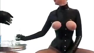 Lesbians wearing latex clothes couldn’t resist their sexual desire and started to fuck
