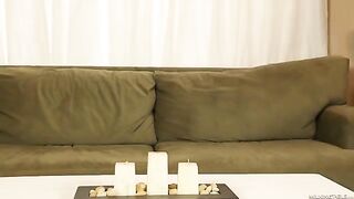 A beautiful, mature woman with big tits in a black dress performs a blowjob