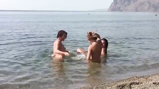 Three erotic pinnacles on a public beach, completely naked and wild!