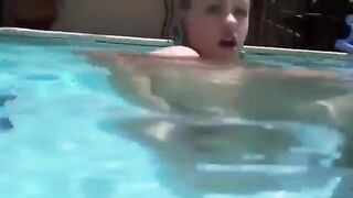 Babe has anal sex using a dildo while in the water