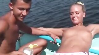 The young people are fucking and drinking on the river bank