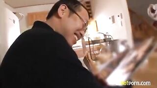A girl is having fun with her classmate right in the classroom