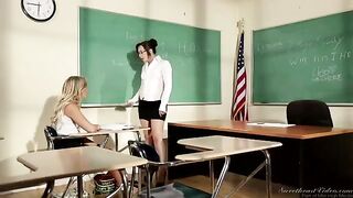 The girl student is being fucked by her lesbian teacher