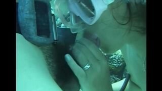 A man has sex with a woman with a hairy pussy underwater