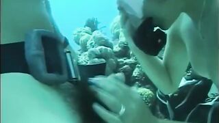 A man has sex with a woman with a hairy pussy underwater