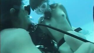 A man has sex with a woman with a hairy pussy underwater