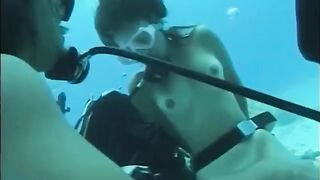 A man has sex with a woman with a hairy pussy underwater