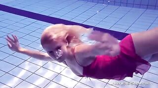 Babe Helen swimming naked in the pool