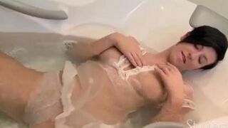 A lonely pregnant brunette masturbates her pussy on the couch, she is so horny