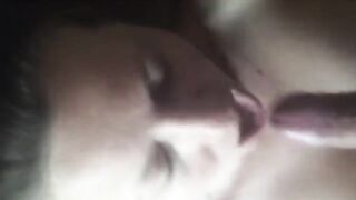 A beautiful woman sucks her lover's dick at home in a steamy scene