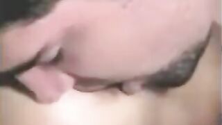 The man fucked by a strapon, while another fingered him