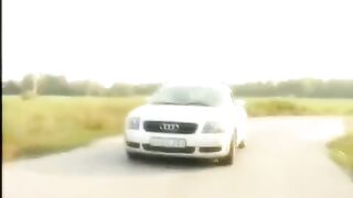 A girl with a shaved pussy is served on the car's bonnet