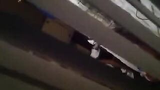 The man shoots his cock in the camera while his neighbors are having sex