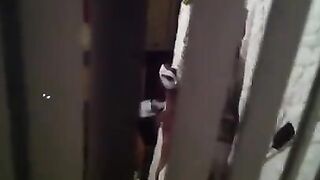 The man shoots his cock in the camera while his neighbors are having sex