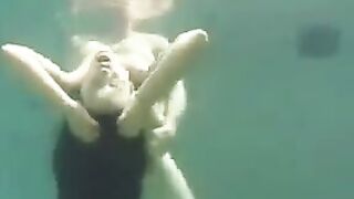 Sex on the beach with a busty brunette beauty