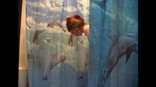 The husband secretly shoots his naked wife in the bathroom with a camera