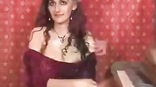 A girl with natural hair plays with her pussy using her fingers in a steamy session