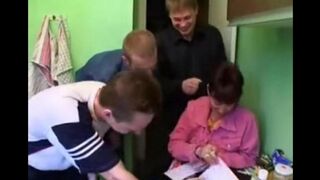 A Russian mother with big natural boobs is sharing cock with three guys