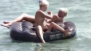 A naked girl is having fun on the mattress, it's very erotic