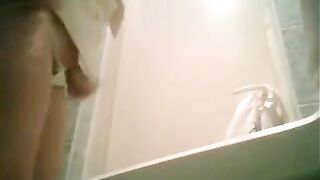 A girl is peeing after graduation on a hidden camera