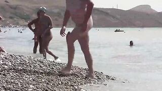 A hot nudist is walking on the beautiful beaches of Crimea
