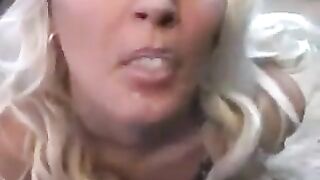 The whimsical woman licks the sperm from a spoon in a sensual scene