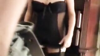 A hot wife in a corset gets fucked by her husband on the bed