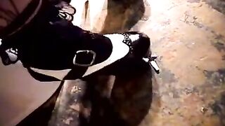 A cute girl masturbates her sweet pussy on the toilet seat